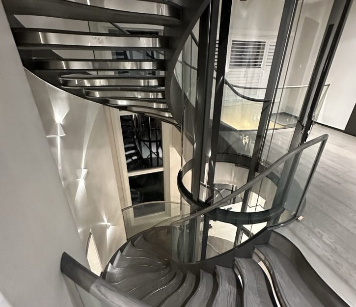 Experience architectural transformation with V.P Stairs Ltd’s Piccadilly staircase, a helical design masterpiece created in eight weeks.