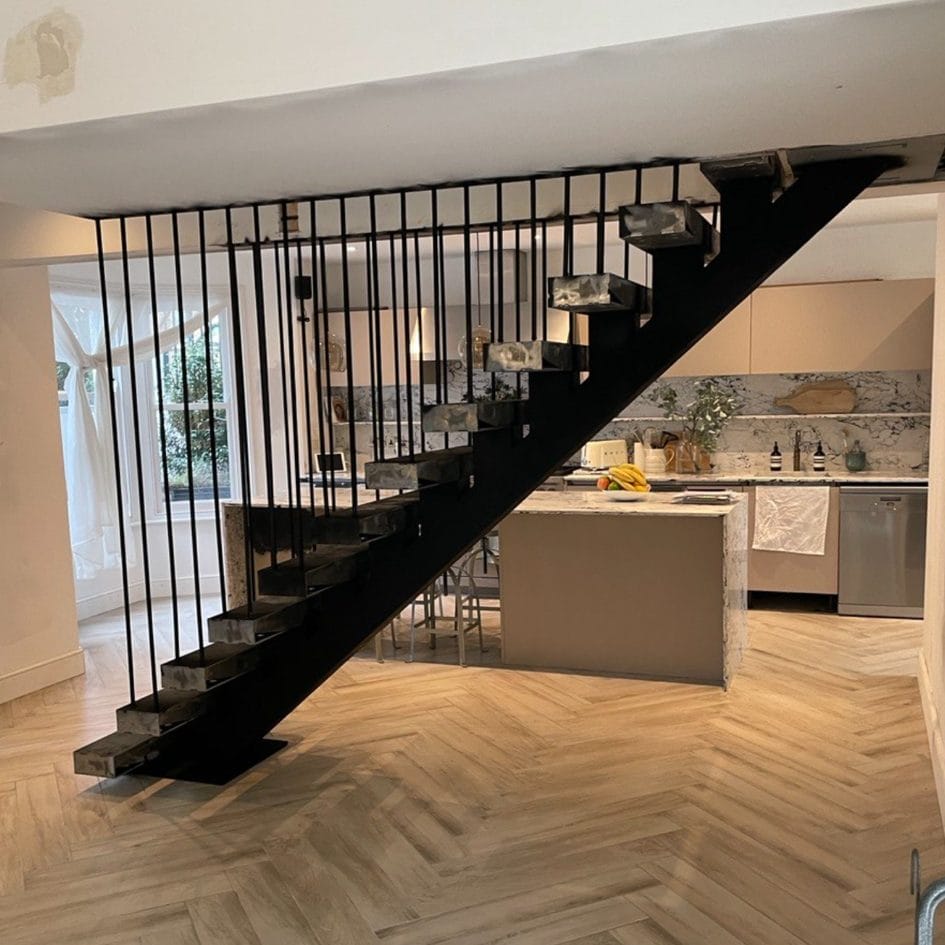 Tooting - spine staircase project, aimed to be modern and sleek looking staircase with bar balustrades