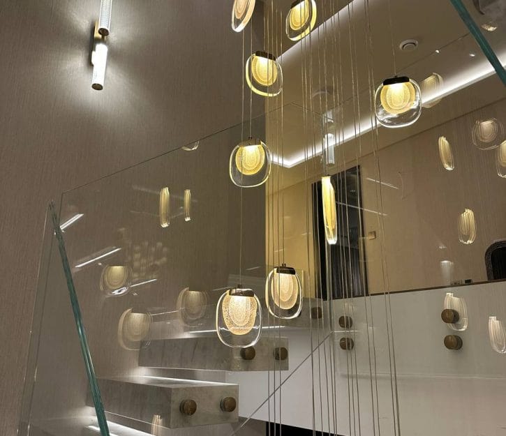 Teddington House B showcases floating staircases that blend interactivity with elegant design, reflecting our commitment to integrating technology with functional artistry.