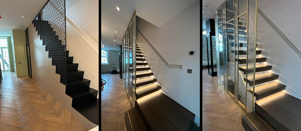 Floating staircase with oak steps, textured glass balustrades, and warm LED backlighting.