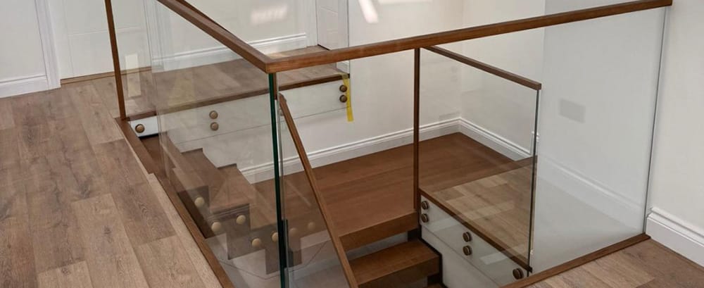 Glass balustrades combined with wooden steps