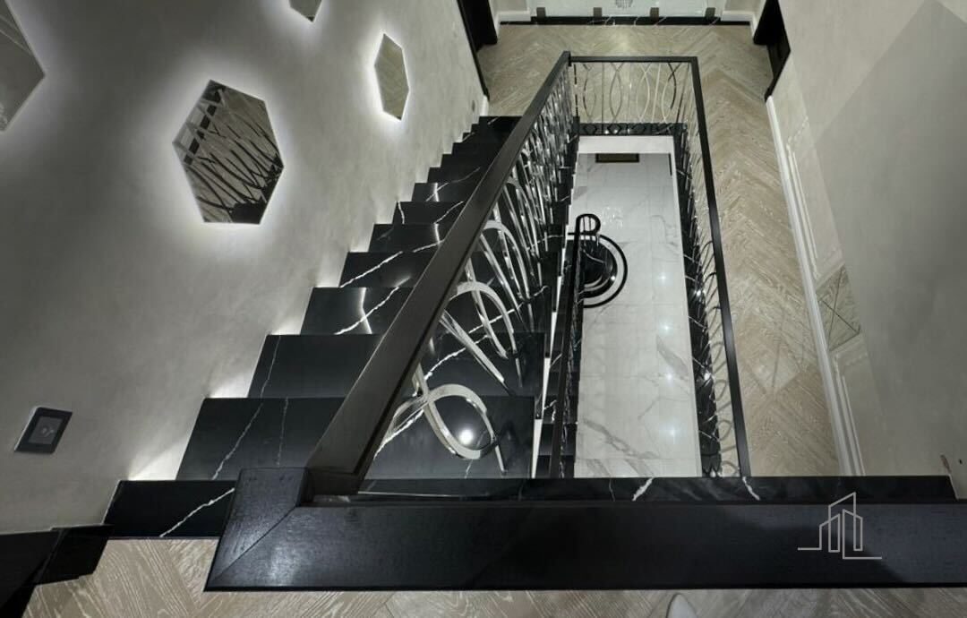 Modern staircase design combining wood, glass, and metal elements by V.PSTAIRS