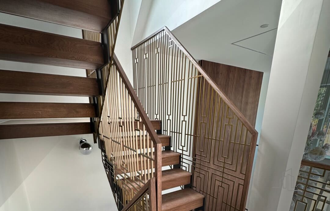 Golden balustrade in a luxury interior with marble flooring