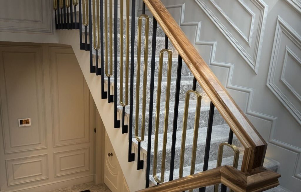 Leather-covered handrail on modern staircase with metal frame