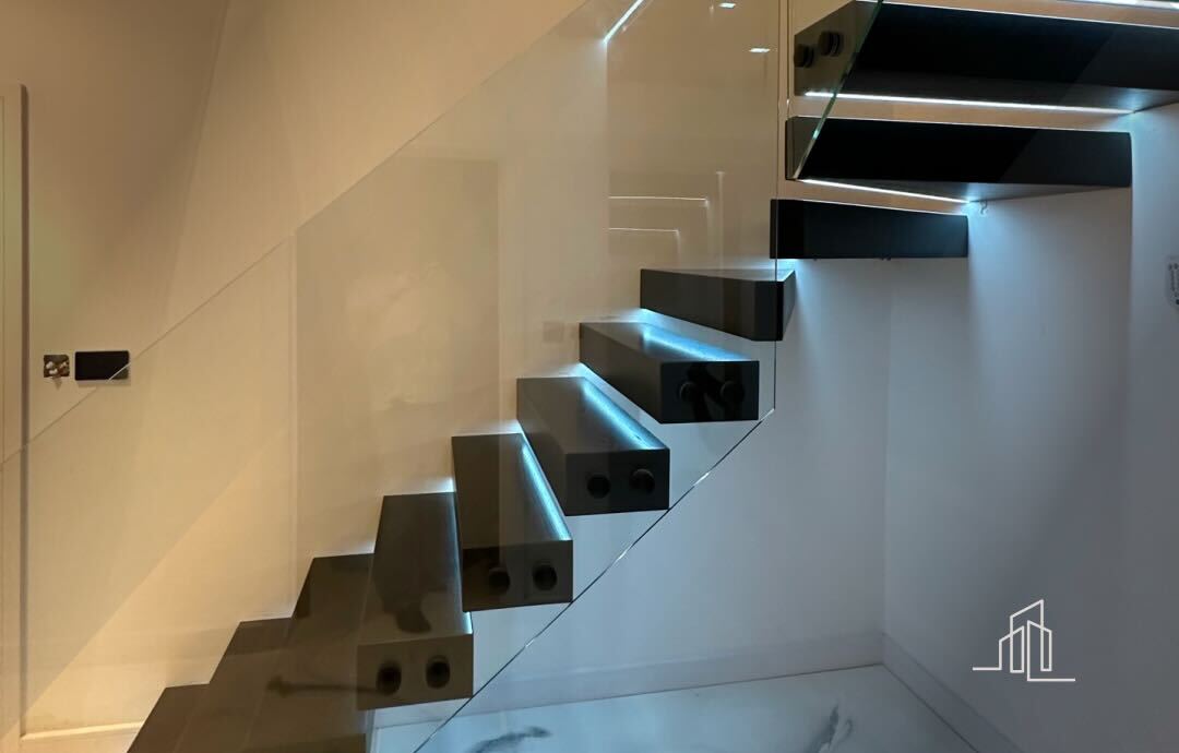 Modern staircase with glass balustrades