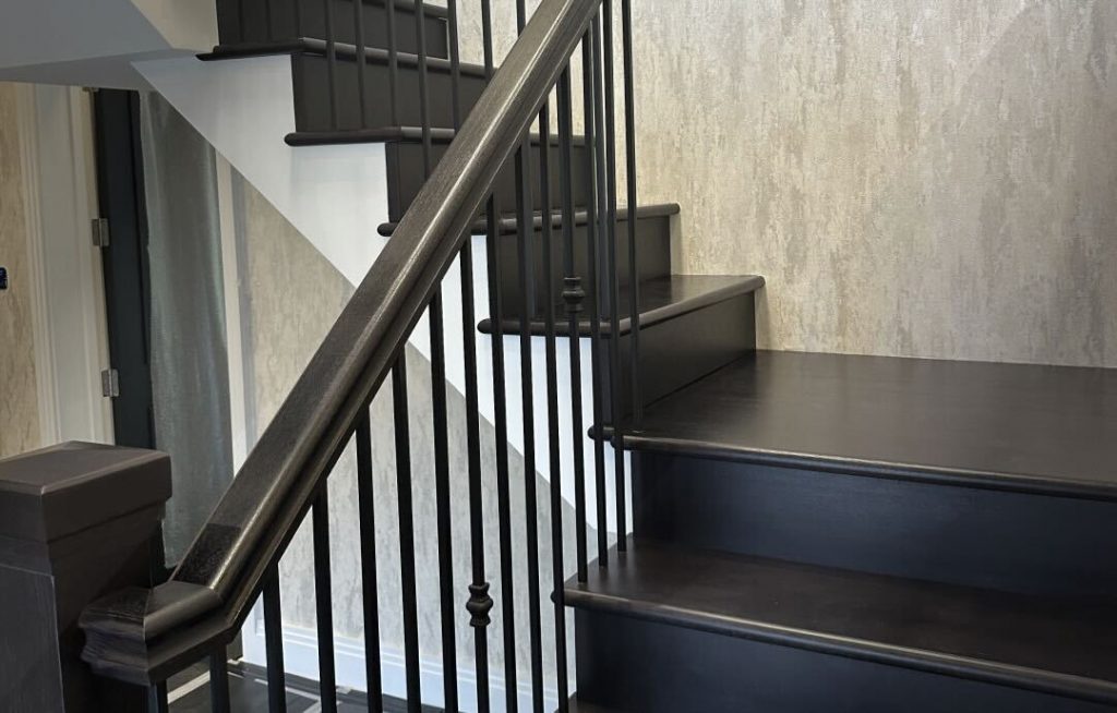 Wooden staircase with black and white colors