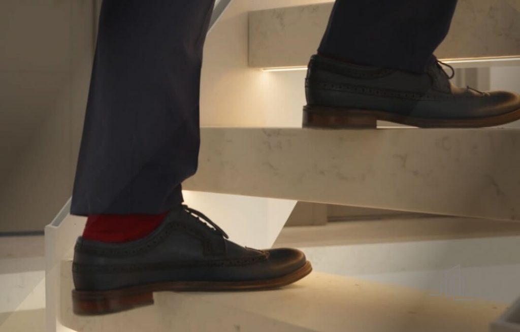 Man walking staircase