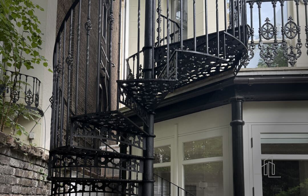 Outdoor staircase measurement process showing clearances and landing space in a UK garden