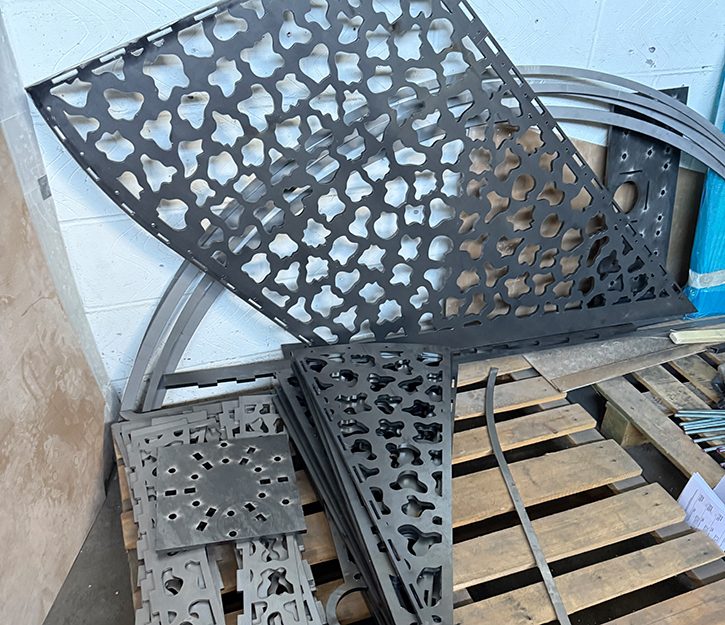 Outdoor steel staircase with openwork steps for drainage