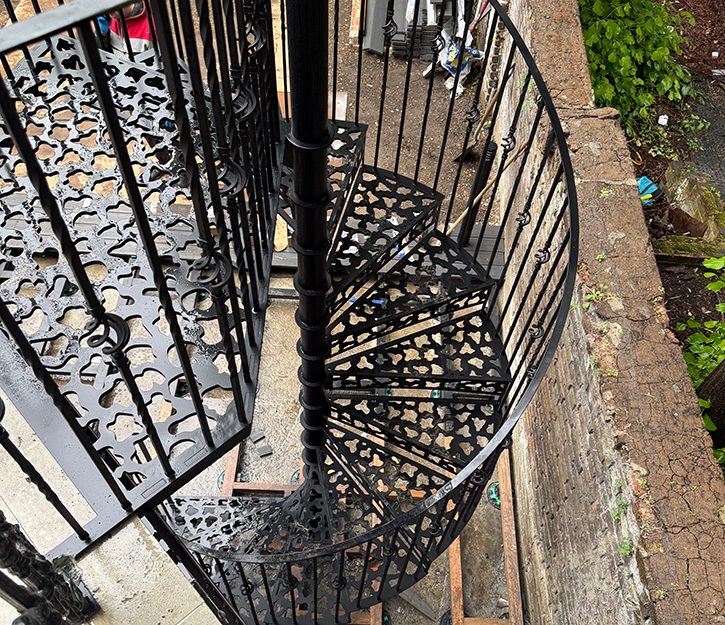 Custom-made garden staircase integrated with house facade