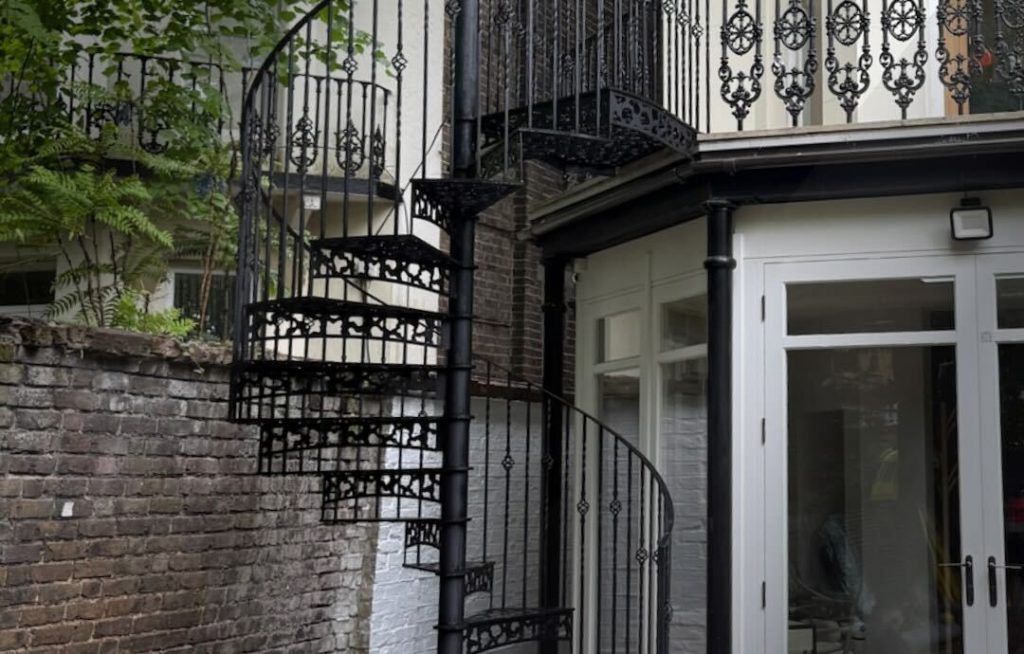 Curved metal frame staircase installed in the garden