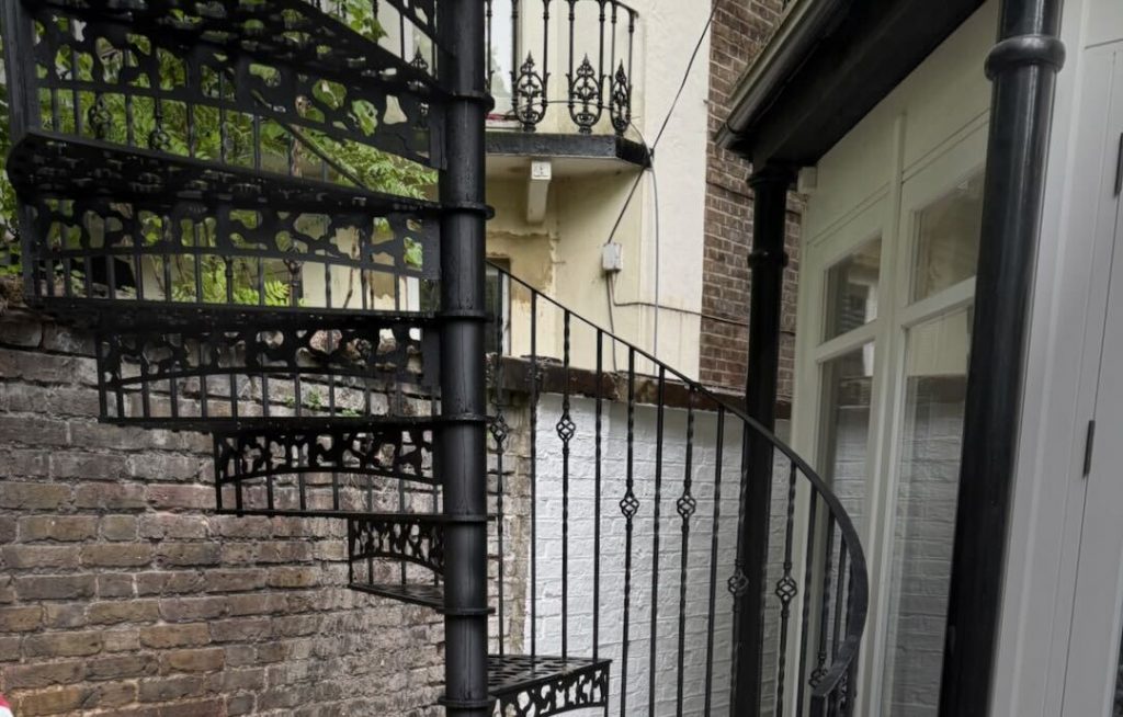 Spiral metal frame staircase installed in the garden