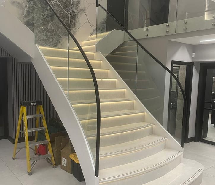 Modern metal and glass staircase in London residence