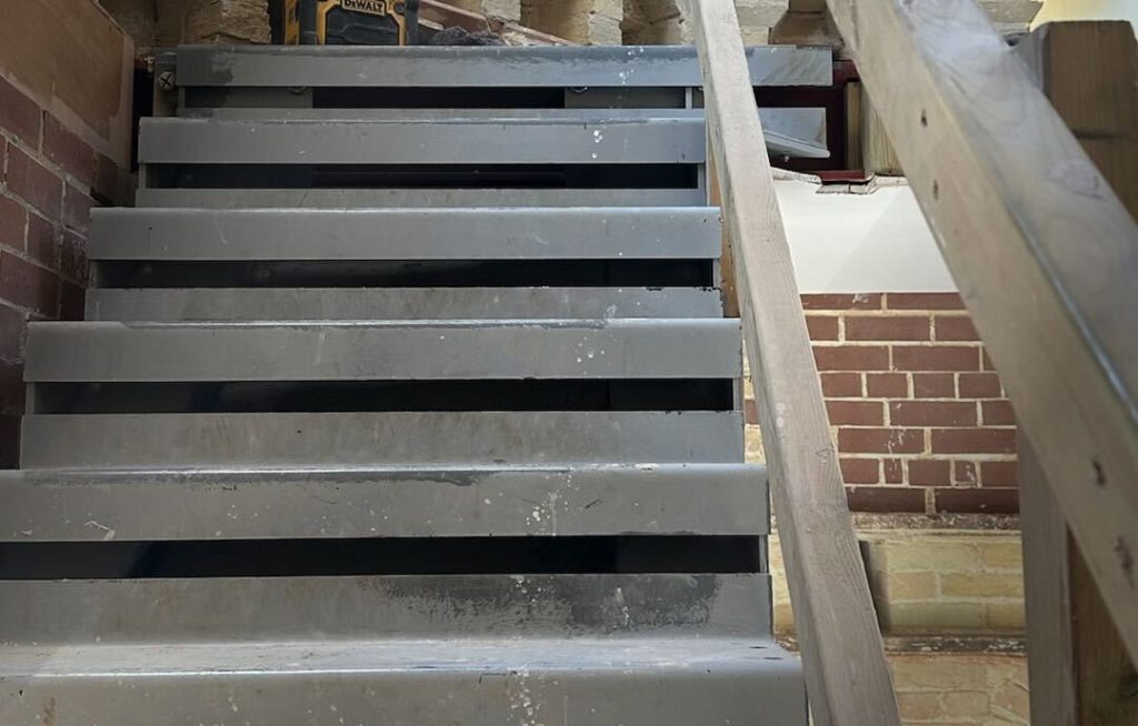 An example of poor quality metal used in the construction of a staircase